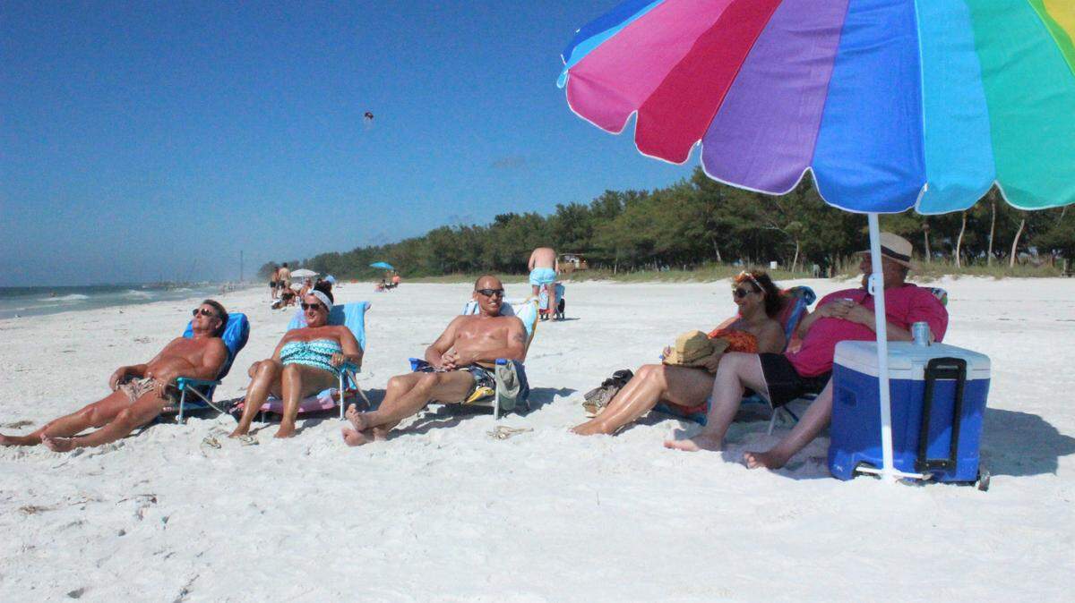 Malcolm and Glynis Ashworth, and Michael, Lesley and John Goodwin came from England to warm up on Anna Maria Island. 
 JAMES A. JONES JR./Bradenton Herald