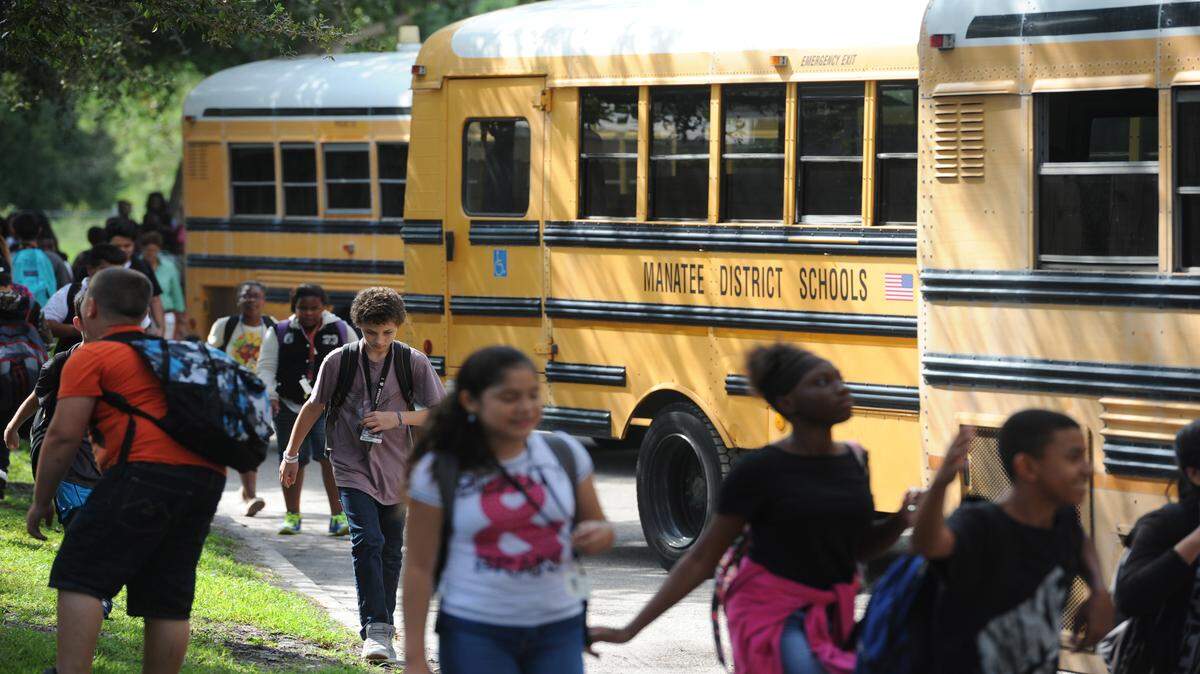 Students board Manatee County School District buses  at King Middle School.GRANT JEFFERIES/Bradenton Herald file