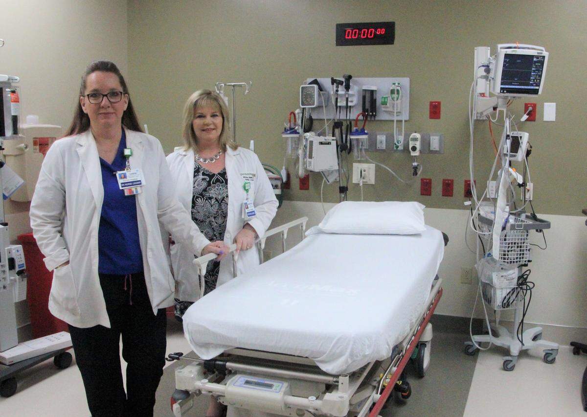 Cheri Morris, left, and Martina Giquinto stand in the emergency care room of Doctors Hospital of Sarasota ER in Lakewood Ranch. The room is reserved for patients needing medical attention most urgently.