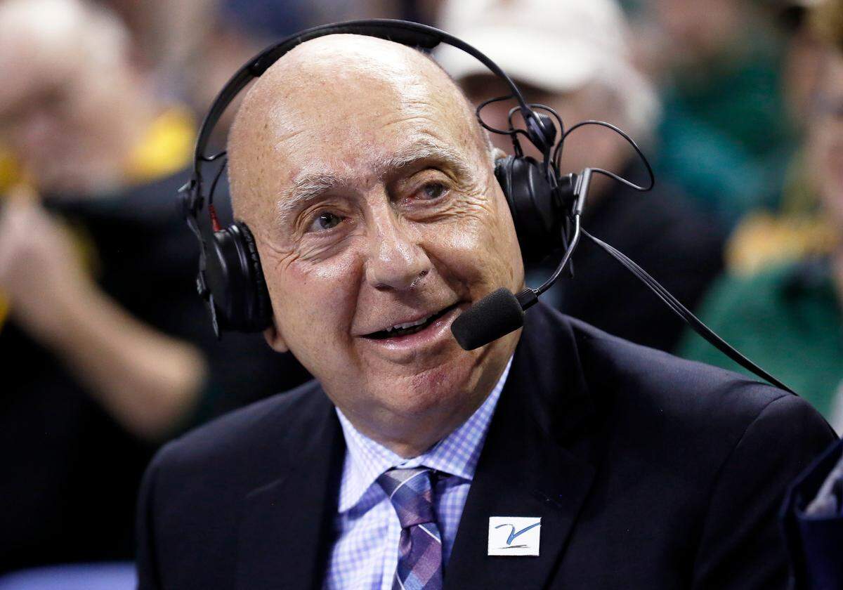 ABC/ESPN basketball analyst Dick Vitale sits at mid-court prior to an NCAA college basketball game between the Baylor Bears and the Villanova Wildcats on Sunday, Dec. 12, 2021, in Waco, Texas.