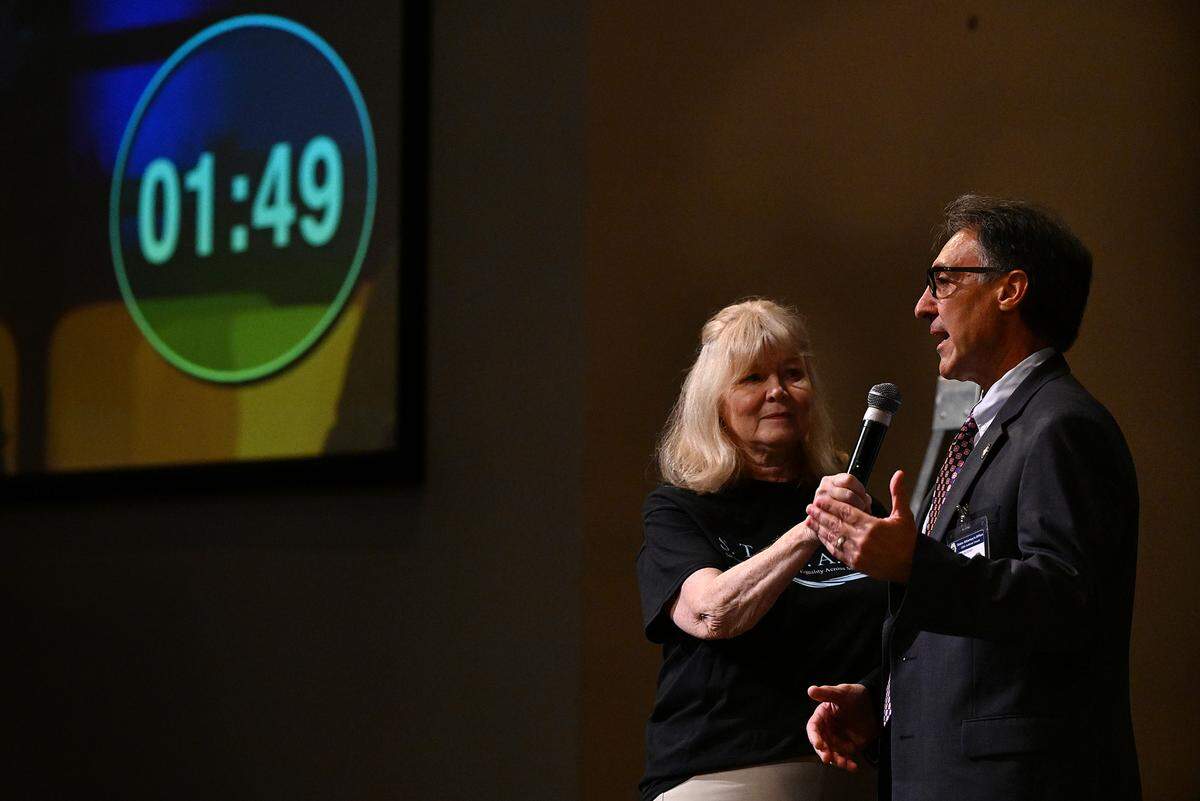 Ed Brodsky, State Attorney for the 12th Judicial Circuit, with Charlotte Wright holding the microphone, addresses the crowd during a meeting of STREAM at the Harvest United Methodist Church in Lakewood Ranch to talk about affordable housing and criminal justice reform. The group, Stronger Together Reaching Equality Across Manatee celebrated some housing victories at the meeting but called for more.