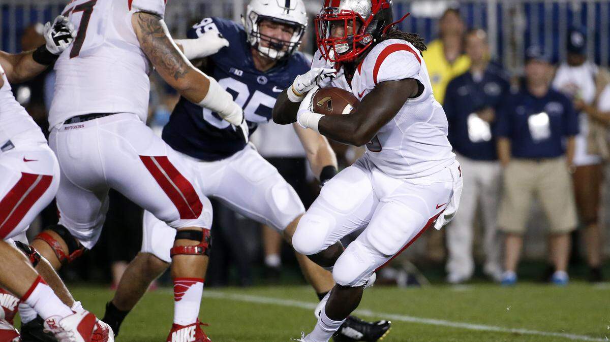 Rutgers running back Josh Hicks, right, gains yards during the first half of a Sept. 19 game against Penn State in State College, Pa. ASSOCIATED PRESS FILE PHOTO