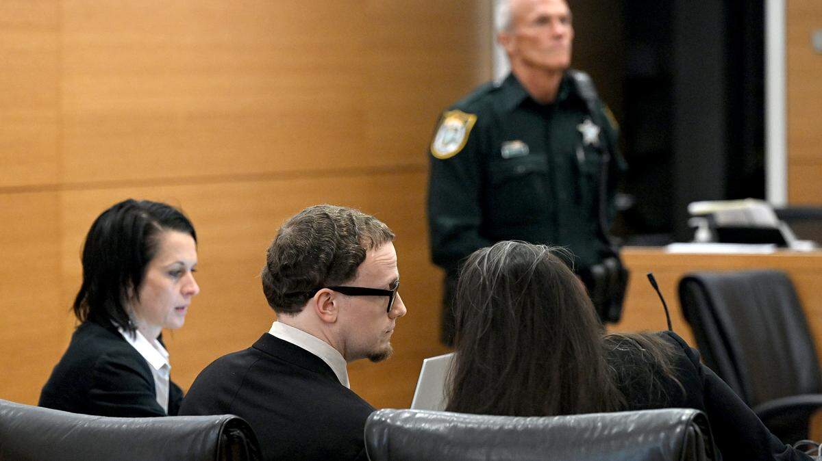 Nicholas Shermer sits between his attorneys in a courtroom in the Manatee County Judicial Center on April 22, 2025. Shermer is on trial for allegedly shooting and killing his girlfriend, Amanda Shoaf, in August of 2023.