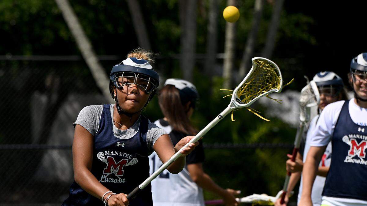 Gabby Waples trains during girls lacrosse practice at Manatee High’s football stadium on Thursday, April 4, 2024.
