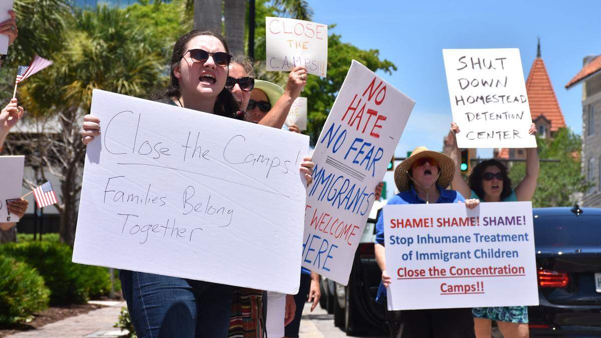 A group of 30 protestors led by Liv Coleman, a former Democrat State Rep. candidate, urged Congressman Vern Buchanan to pass legislation closing immigration detention centers like the one in Homestead, Fla., in downtown Bradenton on July 2, 2019.