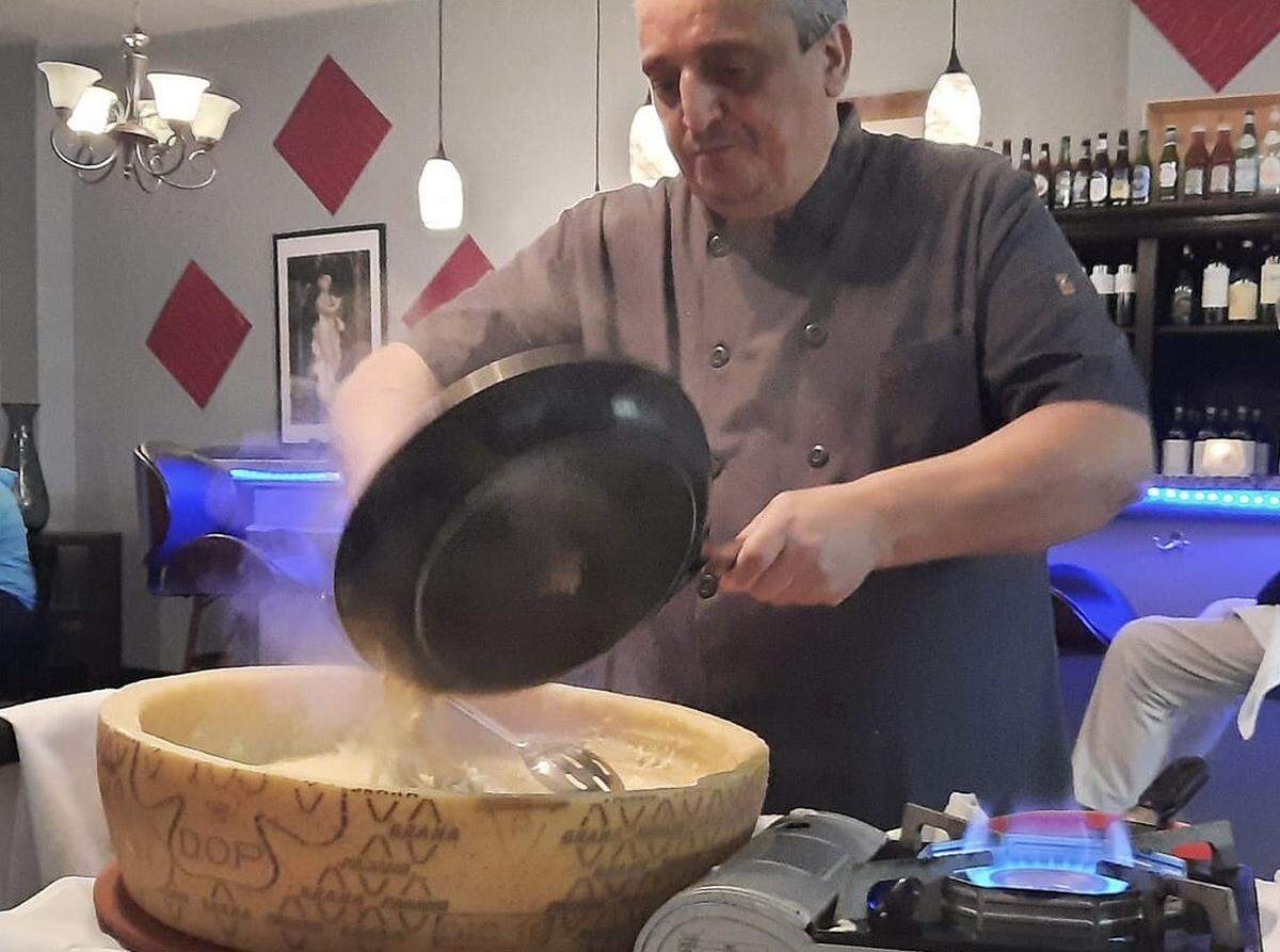 Fusilly’s Kitchen opened in December at 606 Manatee Ave. W., Bradenton, bringing a new Italian gourmet dining experience to the area. Chef Angelo Difiore is shown above with a wheel of parmegianno.