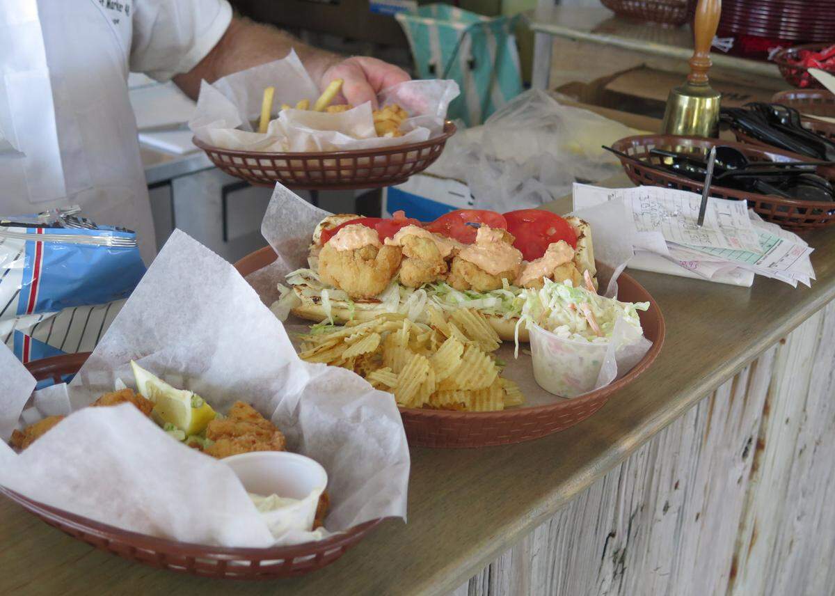 At Tide Tables in Cortez, a simple menu promises food made to order and always fresh, and the seafood often is locally caught.