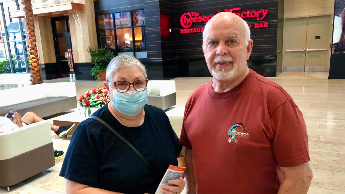 5/18/2021--Rita and Michael Piovane visited the Mall at University Town Center this week. Michael did not wear a mask, but he had one in his pocket for businesses that require them. Both have been fully vaccinated.