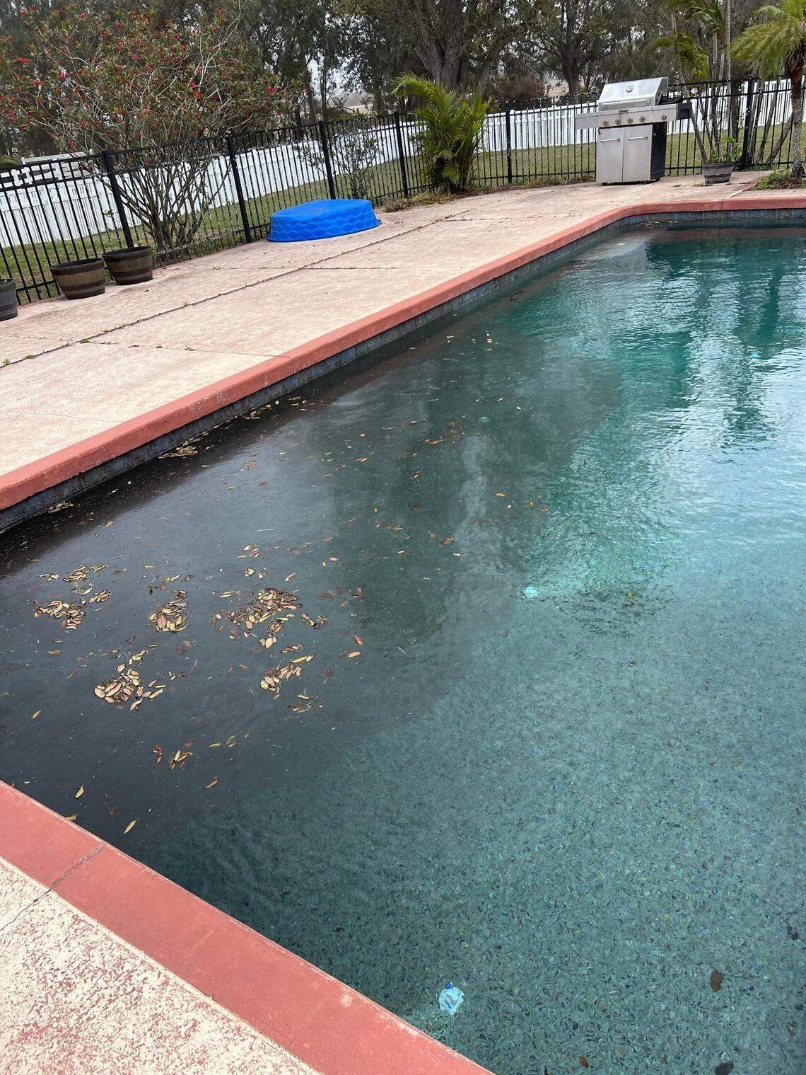 Foxbrook resident Kim Bruenner says construction dirt blew into her porch in Parrish on March 5, contaminating a cup of coffee.