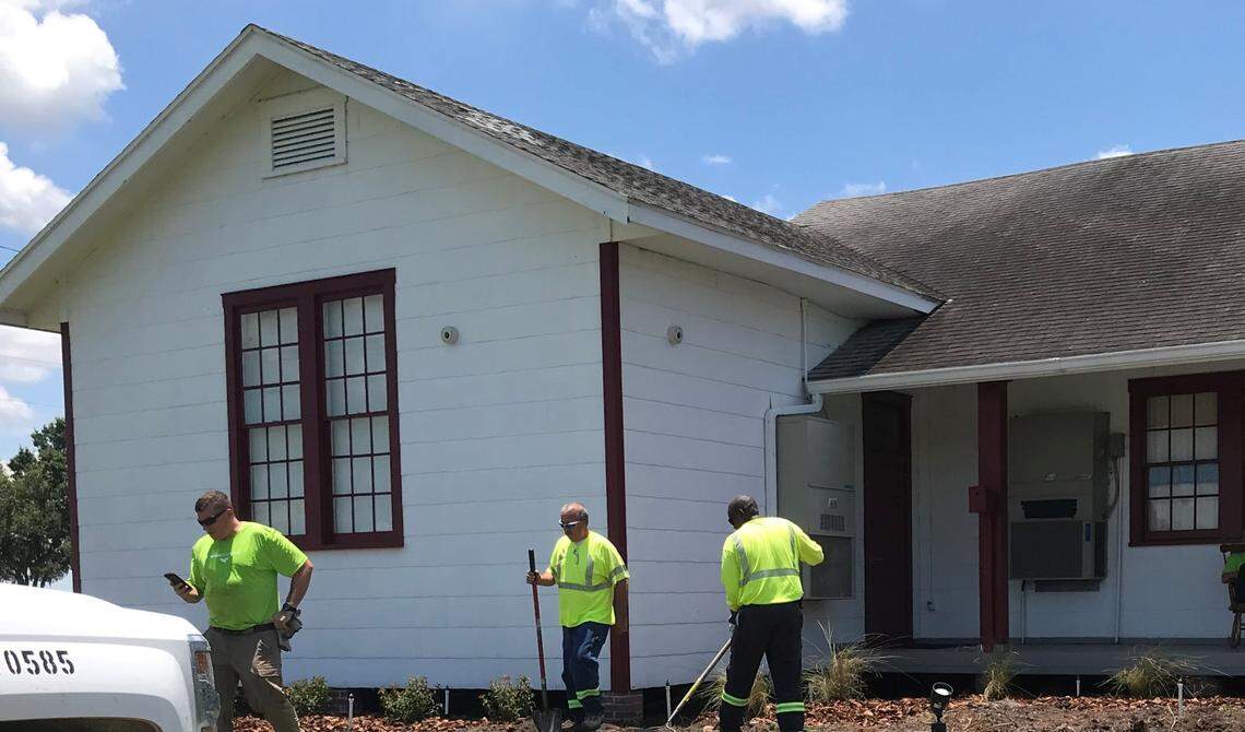Volunteers from Mosaic recently freshened up and replaced landscaping at the historic one-room school in Duette. The company also donated a new flag for the site.