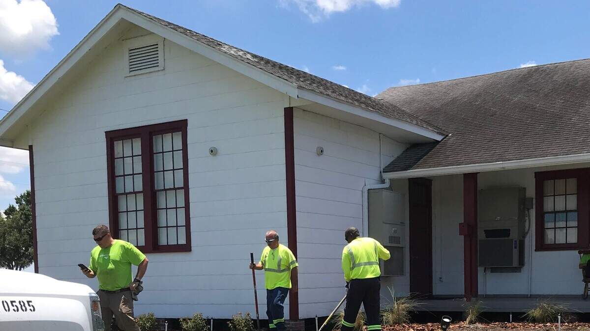 Volunteers from Mosaic recently freshened up and replaced landscaping at the historic one-room school in Duette. The company also donated a new flag for the site.