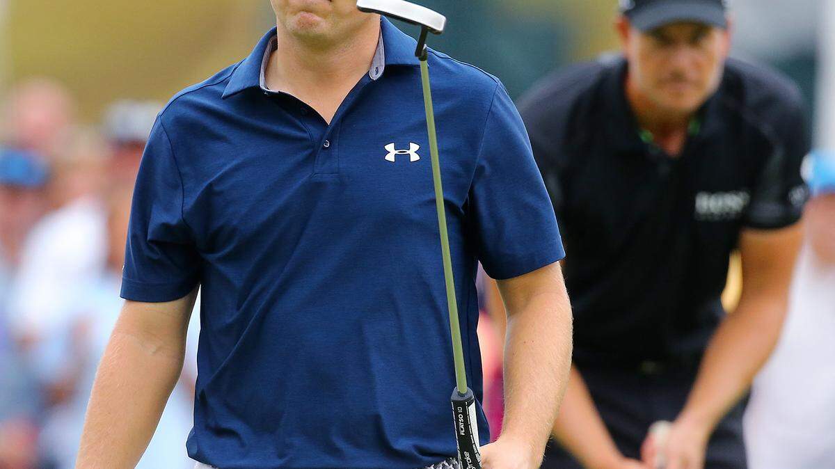 Jordan Spieth makes a long birdie putt on the 9th hole during the final round of the Tour Championship on Sunday at East Lake Golf Club in Atlanta. ASSOCIATED PRESS