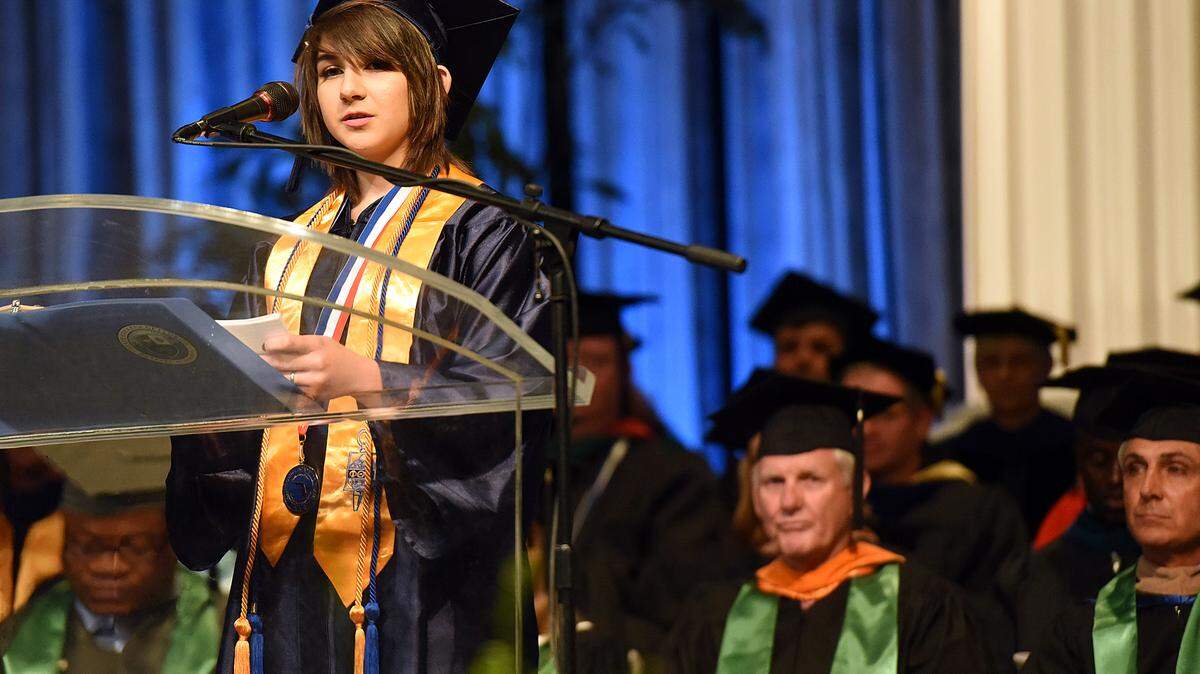 Student speaker Katherine Brown, on the 2016 All-Florida Academic Team, gives her speech at the State College of Florida's graduation ceremony held at the Bradenton Area Convention Center Friday night. 
 TIFFANY TOMPKINS/Bradenton Herald