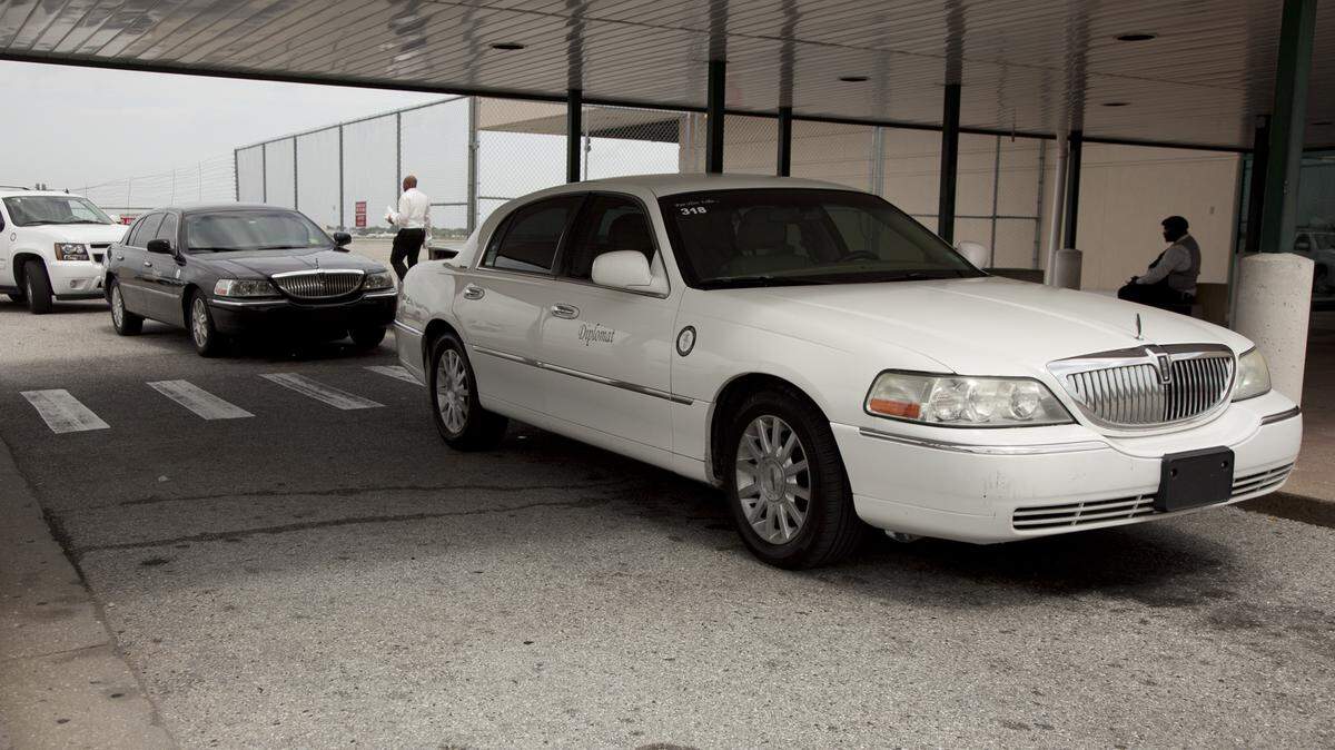 Diplomat Taxi vehicles queue at Sarasota Bradenton International Airport. The company is getting new majority ownership and will get a makeover that includes new vehicles, in-vehicle pay-by-credit card terminals and online ride booking. MATT M. JOHNSON/Bradenton Herald