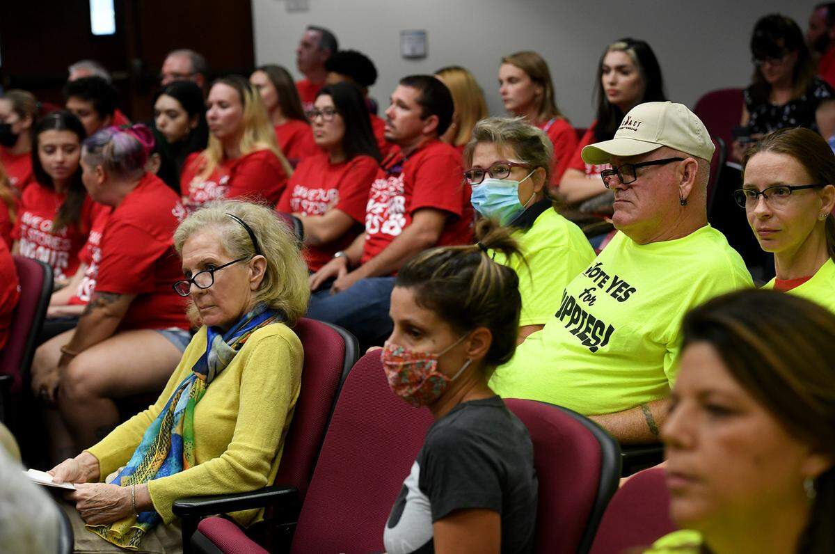 08/10/21—The Manatee County Commission ended the retail ban on the sale of cats and dogs following a lawsuit from local Petland pet store owners. In this Bradenton Herald file photo, advocates for Petland wear red shirts and those supporting the ban wear green while attended a meeting of the Manatee Board of County Commissioners in August 2021.