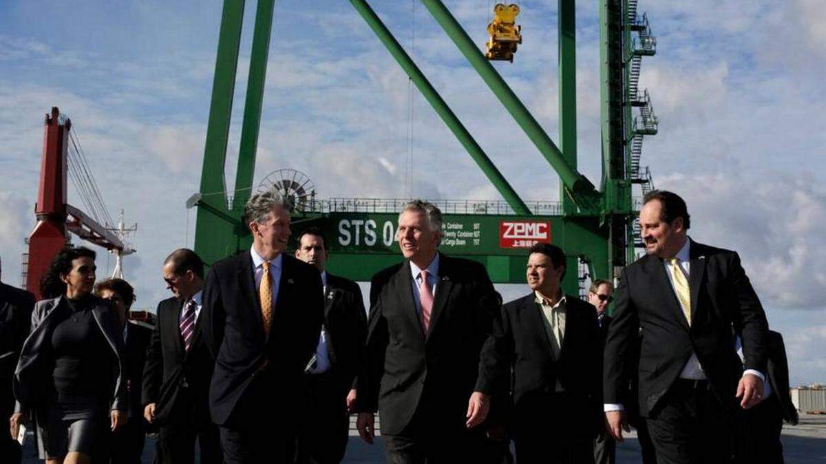 Virginia Gov. Terry McAuliffe, center, walks with members of his delegation, during a visit to the Special Development Zone at the port of Mariel, near Havana, Cuba, Tuesday, Jan. 5, 2016. The U.S. on Tuesday announced new guidelines allowing for financing of all licensed exports to the island, except agriculture. 
 By Enrique de la Osa - AP
