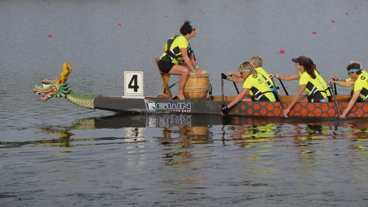 4/21/18--A dragon boat team paddles to the starting line during the 2018 Sarasota International Dragon Boat Festival.
