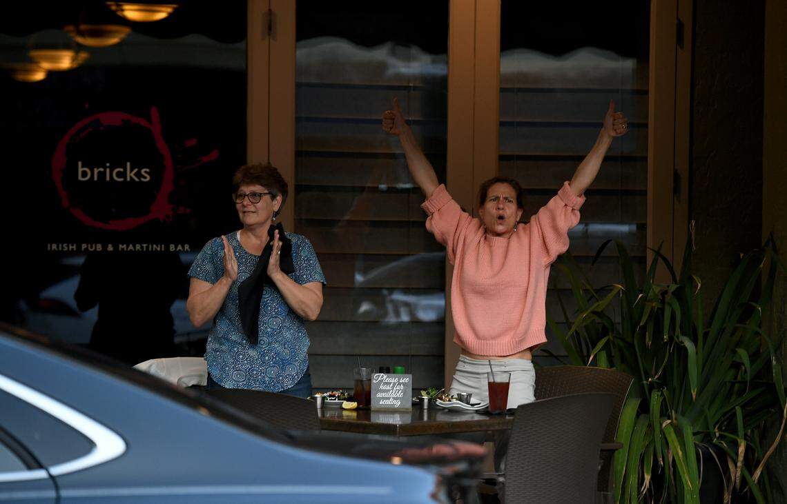Patrons of O’Bricks cheer as over a hundred people joined a march and rally organized by Women’s Voices of SW Florida to support women’s rights to choose abortion on May 4, 2022. The group met at the Central Library and marched to the Historic Courthouse.