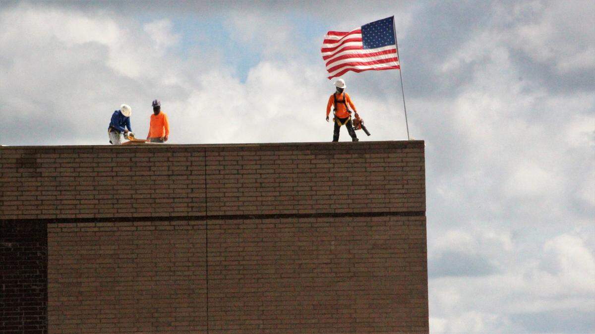 The American flag was flying from the roof of the Barbara A. Harvey Elementary School this week in Parrish. The school, under construction off Moccasin Wallow Road, is scheduled to open in August to help meet the needs of the growing North River area.