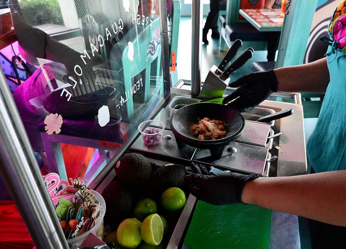A server prepares guacamole at Aqua Tequila Mexican Restaurant Grill and Cantina in Parrish on Feb. 19, 2026.