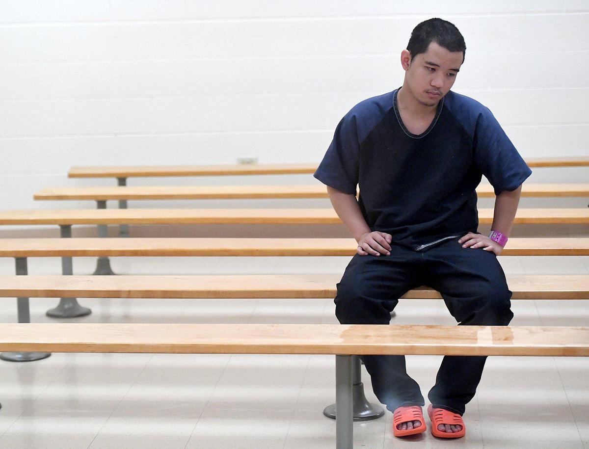 Ande Ebalan sits for a short time in the area designated for first court appearances at the Manatee County Jail where he bonded out before appearing before Judge Diana Moreland. Ebalan said he shot Ryan Booth in self-defense during a drug deal.