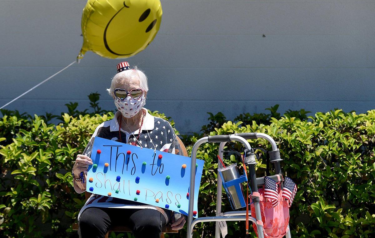 Families of residents of residents of Manatee River Assisted Living Facility got to visit at a safe distance as they rode by in a parade Friday afternoon.