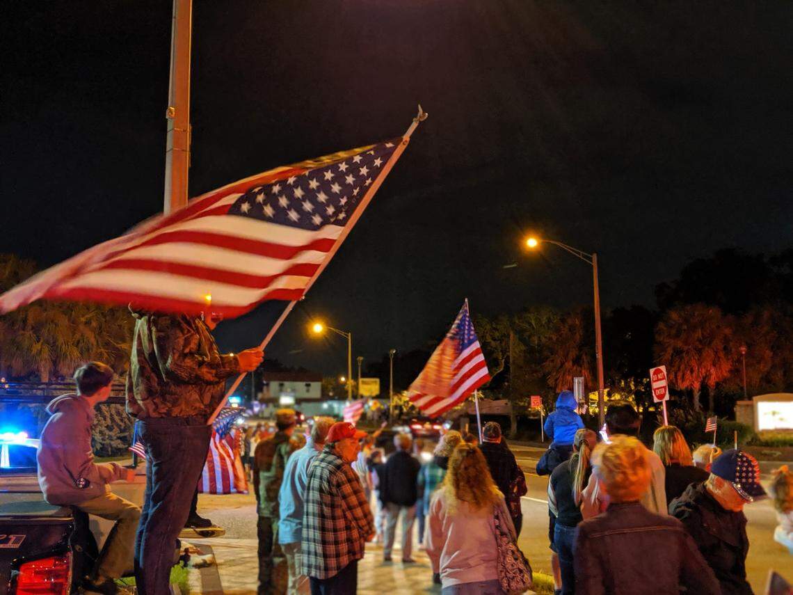 Manatee County residents gathered at north side of the Green Bridge in Palmetto to pay tribute to Spc. Nicholas C. Panipinto, who died on a training mission in South Korea last week.