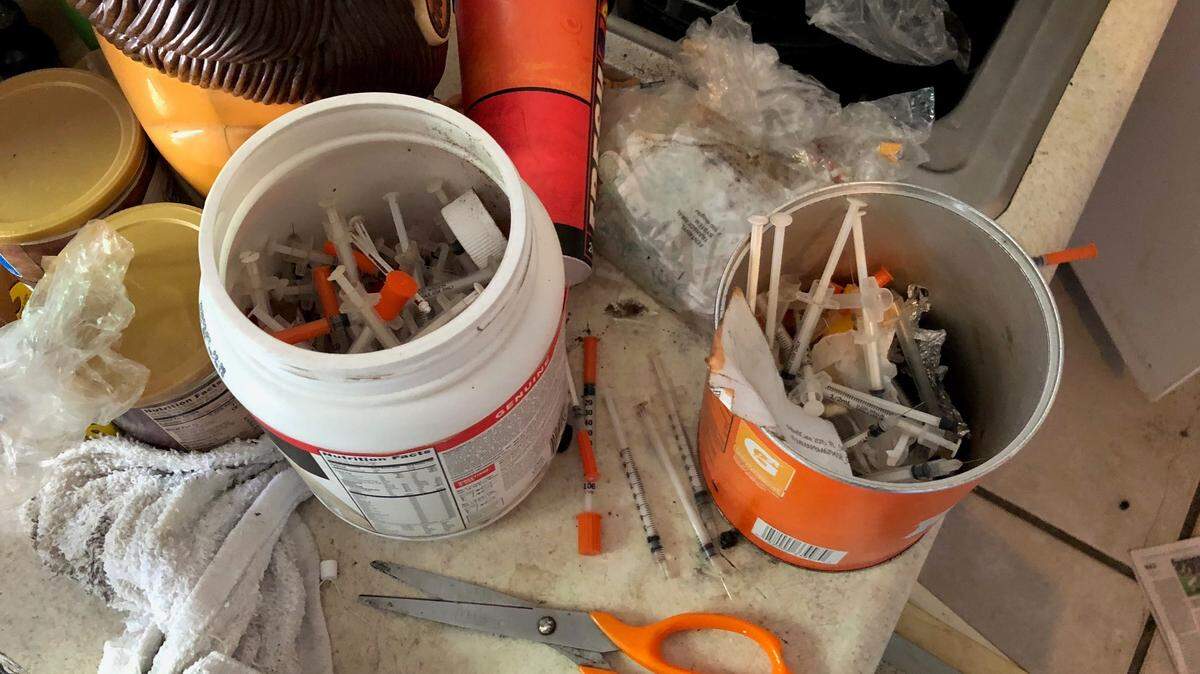 While executing a search warrant, detectives found buckets of needles, as well other drugs, inside a Sarasota home. Three people who lived in the home are facing drug charges. 