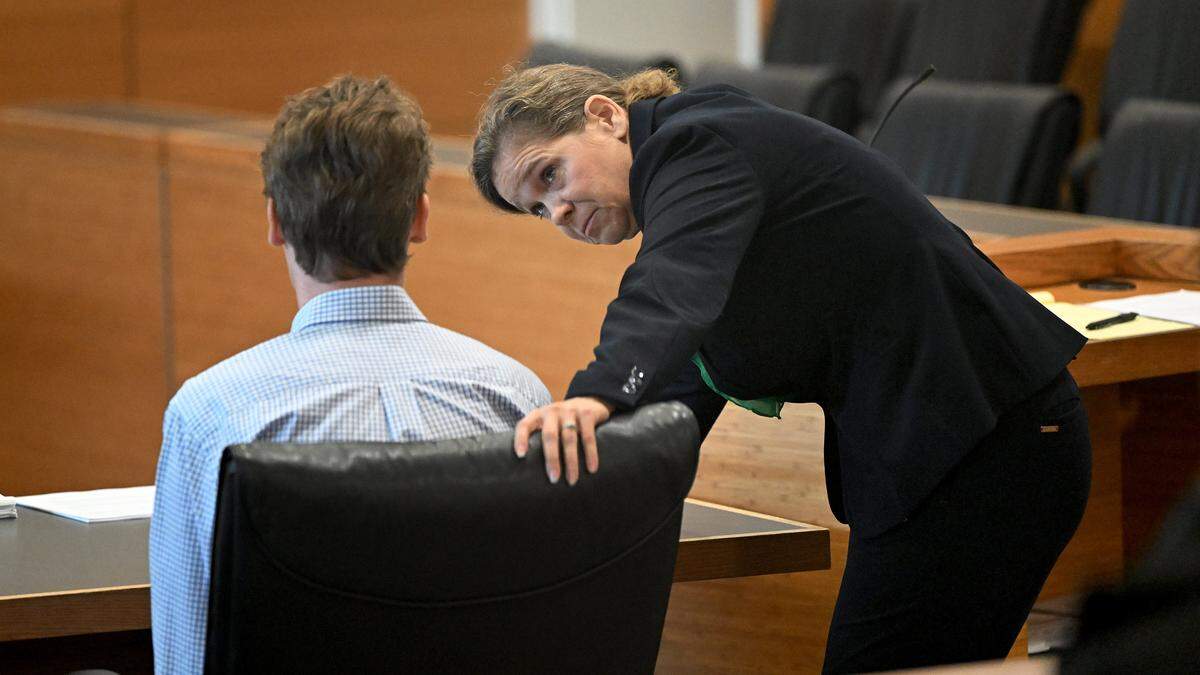 Defense attorney Jennifer Fury consults with her client, Brennon Cooper Brown, 25, during his sentencing hearing Wednesday at the Manatee County Judicial Center in Bradenton. Brown was sentenced to more than five years in prison for sexually abusing a 14-year-old student, according to court records.