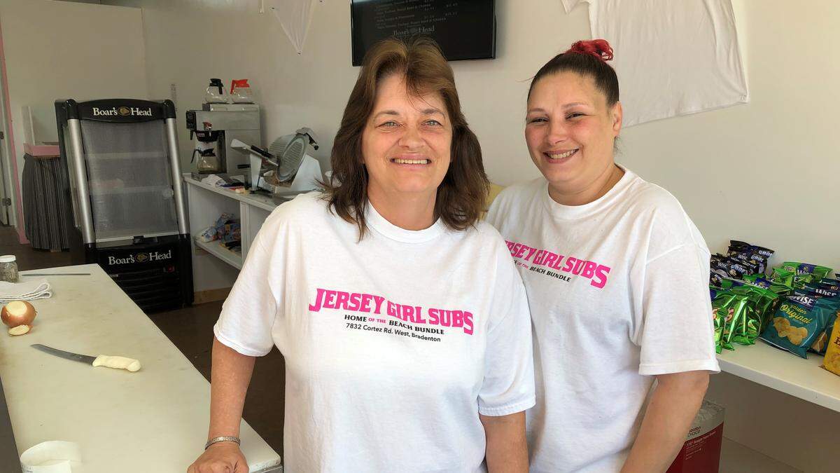 Renee Heatley, left, and Kim Gomez, prepare the sandwiches at Jersey Girl Subs, which opened recently at 7832 Cortez Road W. in the Coral Way Plaza.