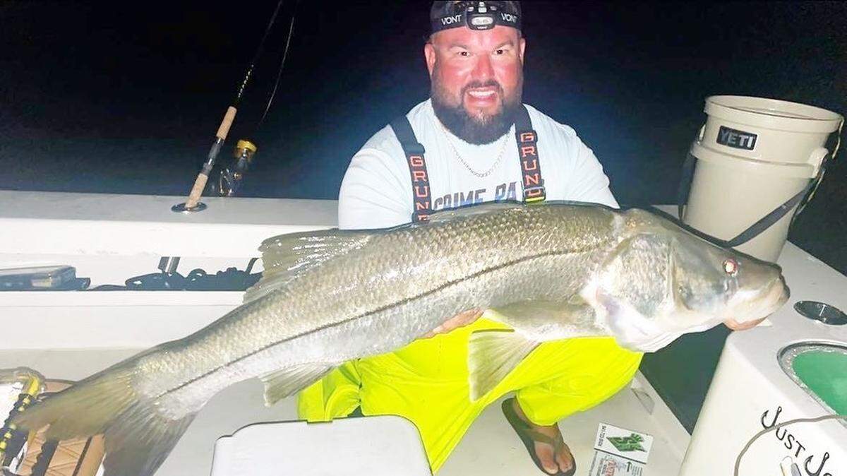 Josh Jordan shows a snook he caught during the Big Art Memorial Snook Tournament June 24-26.