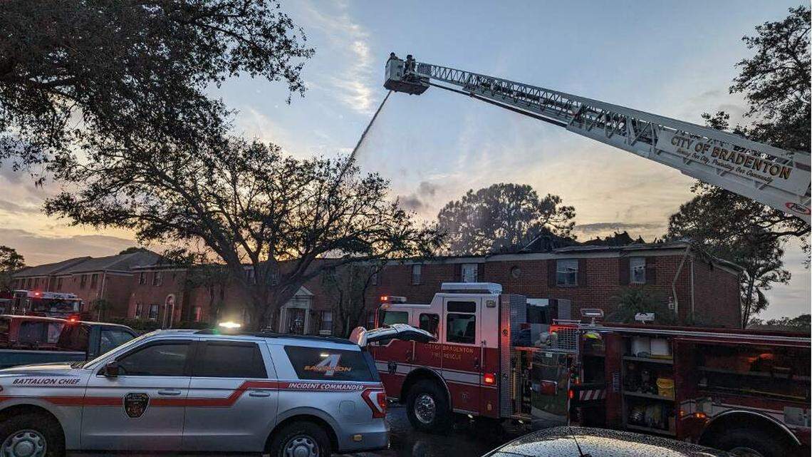 Firefighters work to put out a fire at Carlton Arms of Bradenton apartments on Wednesday, Jan. 4, 2023.