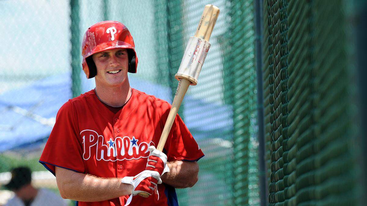 In this file photo, former Manatee High baseball star Cord Sandberg warms up to bat in a Gulf Coast League game between the Phillies and the Pirates at Pirate City.