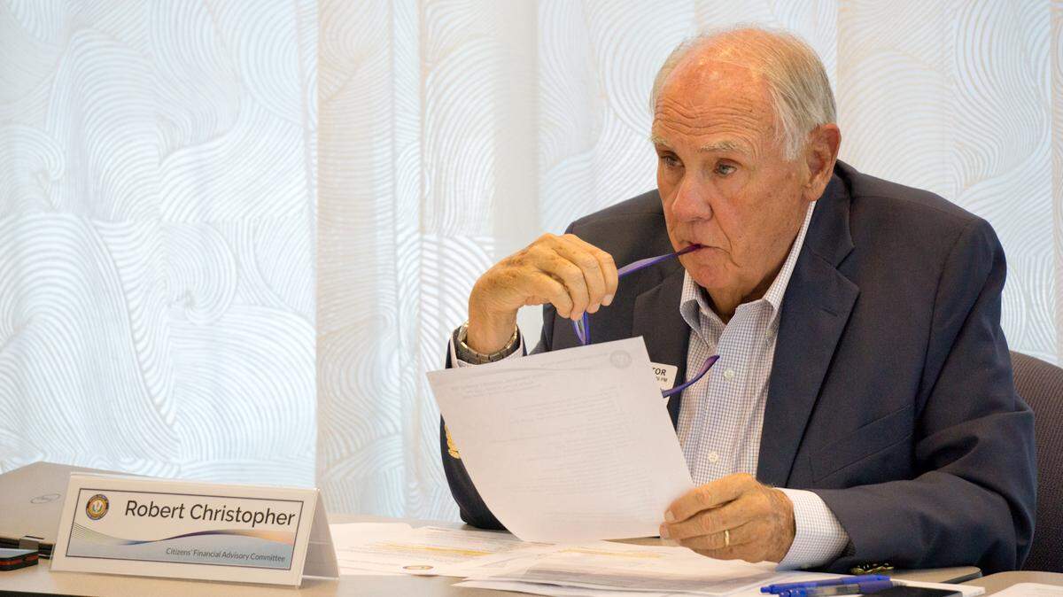 Robert Christopher, chair of the Citizens' Financial Advisory Committee, oversees the group's July 17 meeting. The group formed subcommittees, introduced new members and approved a draft charter.