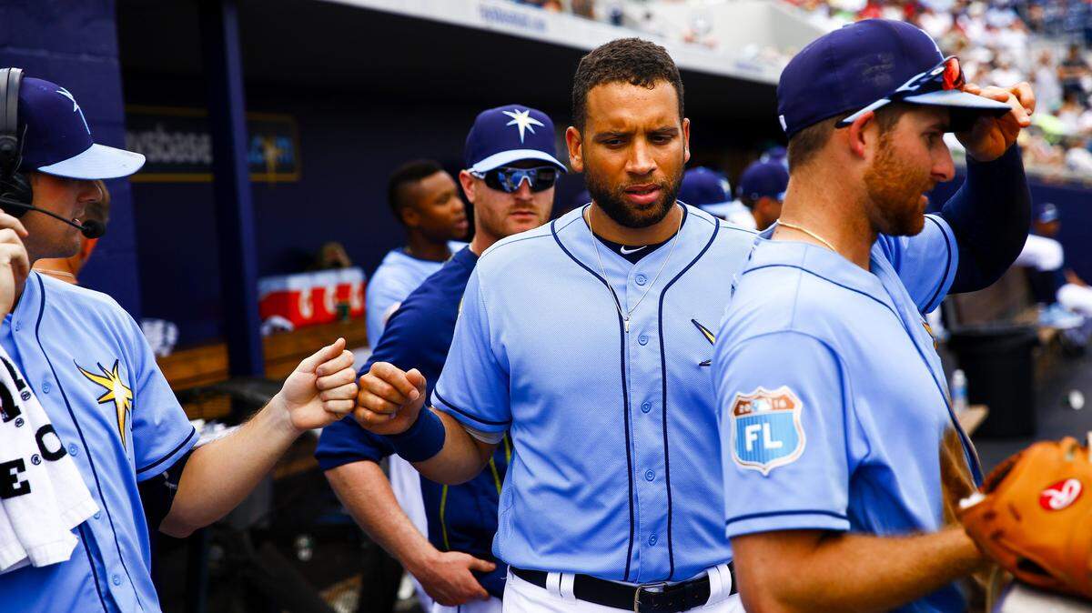 Tampa Bay Rays first baseman James Loney (21) gets a fist bump from starting pitcher Drew Smyly (33) during a spring exhibition baseball game against the Boston Red Sox, Wednesday, March 30, 2016 in Port Charlotte, Fla. (Will Vragovic(/The Tampa Bay Times via AP) TAMPA OUT; CITRUS COUNTY OUT; PORT CHARLOTTE OUT; BROOKSVILLE HERNANDO TODAY OUT; MANDATORY CREDIT