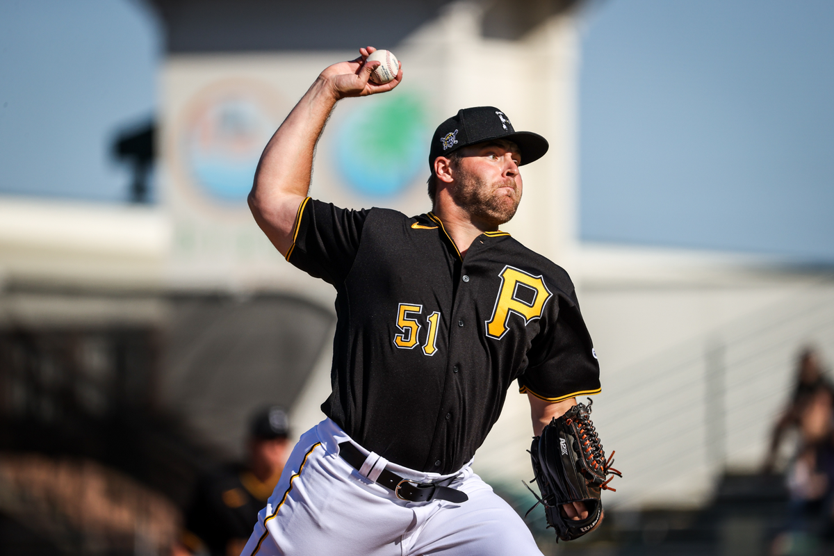 Pittsburgh’s own David Bednar holds his breath before releasing a pitch during a spring training game at LECOM Stadium in Bradenton,fl.