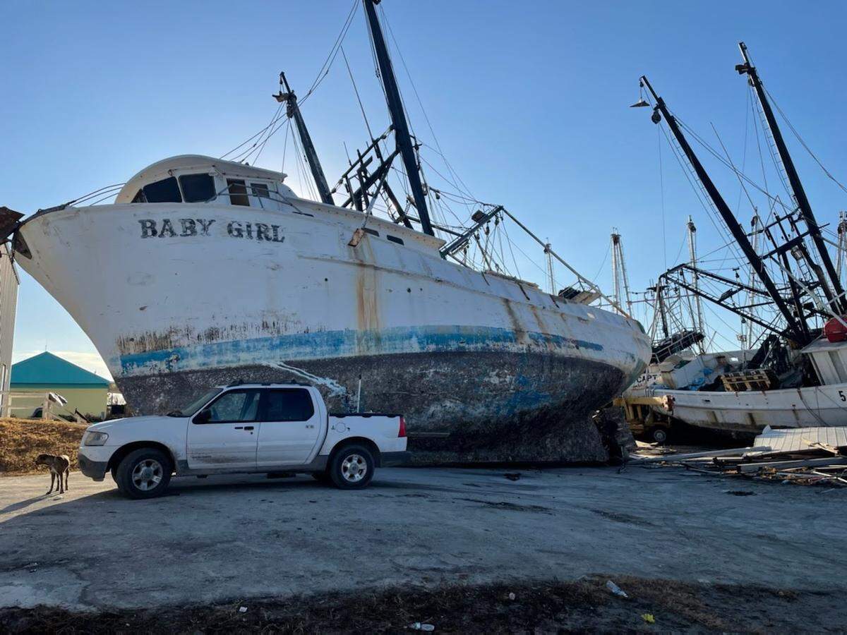 Many of the commercial fishing boats in the Fort Myers area were completely on land after Hurricane Ian flooded the city.