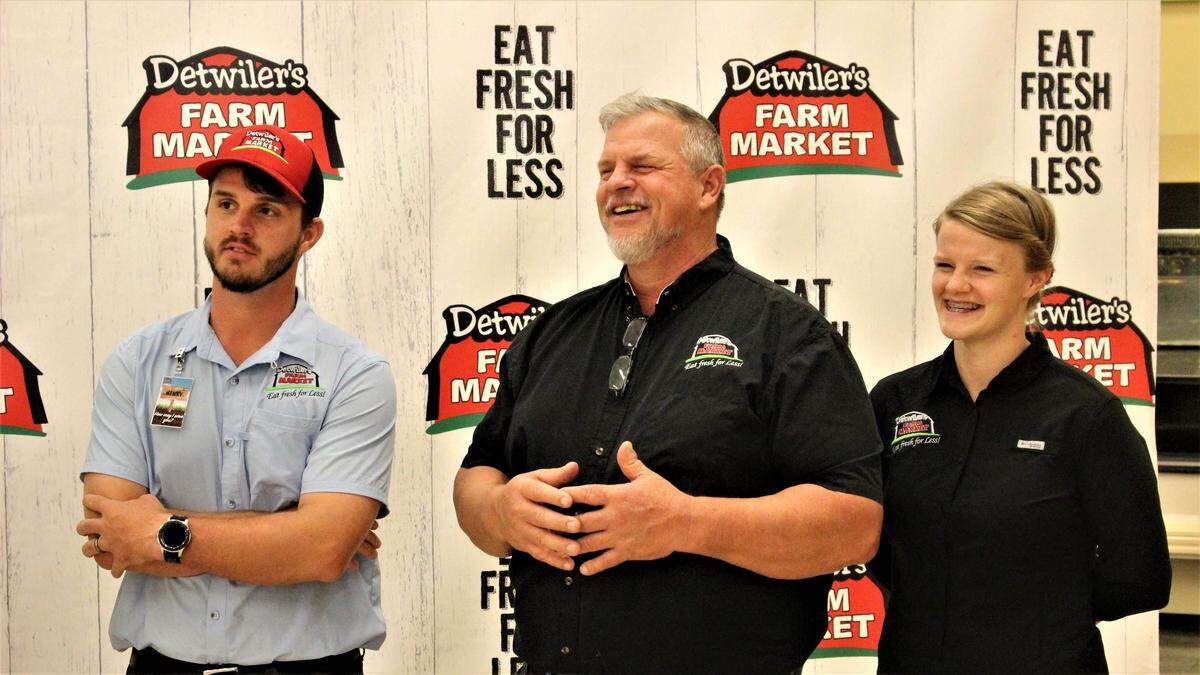 Family patriarch Henry Detwiler Sr. is flanked by his son, Henry Jr., and daughter, Gracie, during the announcement of plans for a new Detwiler’s Farm Market at 2881 Clark Road.