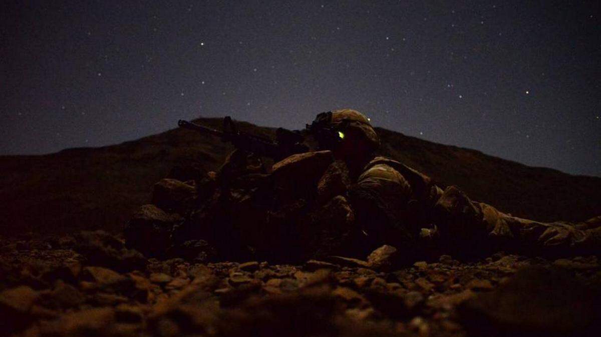 Florida National Guard Spc. Micah Whitten watches his area of responsibility during a field training exercise March 16, 2016, in Arta, Djibouti. STAFF SGT. KATE THORNTON U.S. AIR FORCE