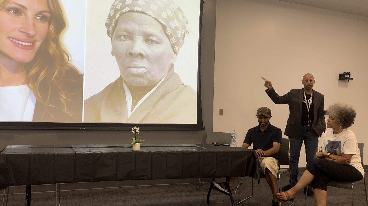 Harriet Tubman’s relative, A.J. Brickler III, spoke during a Q&A session hosted by the Family Heritage House, he pointed to a comparison of Tubman and Julia Roberts, after sharing Roberts was discussed to play Tubman in the “Harriet” film released in 2019. His son, A.J. Brickler IV, and sister Celeste Brickler Hart looked on. 05/14/2022.