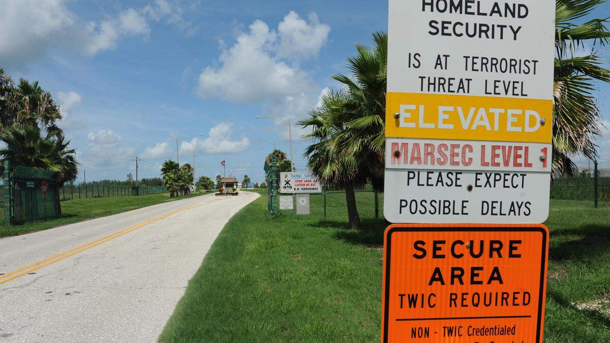 A narrow roadway and guard shack at South Dock Street will be expanded this coming spring and summer at Port Manatee to accommodate more and heavier traffic. GRANT JEFFERIES/Herald file photo