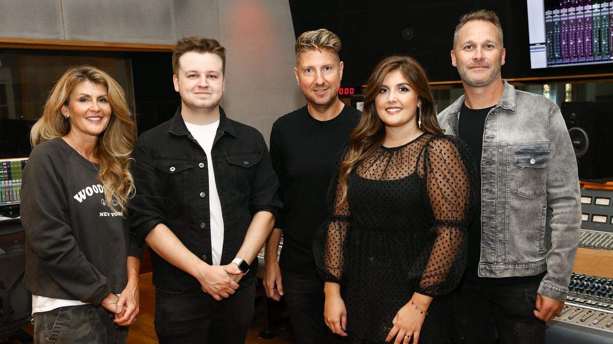 Bradenton native Ryan Wesley Smith, second from the left, has launched his own Christian music label in Nashville and his flagship artist, Abby Robertson, front, is set to debut the label’s first single on Feb. 12.