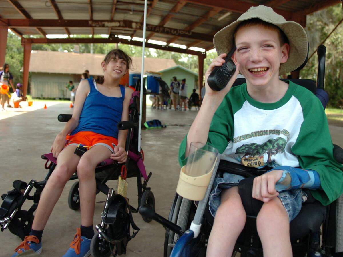 Campers Krissy Rio and Matt Walker during game time at the Foundation for Dreams Dream Oaks Camp on June 11, 2007. Dream Oaks Camp, located at Camp Flying Eagle on Upper Manatee River road, serves children with various disabilities.