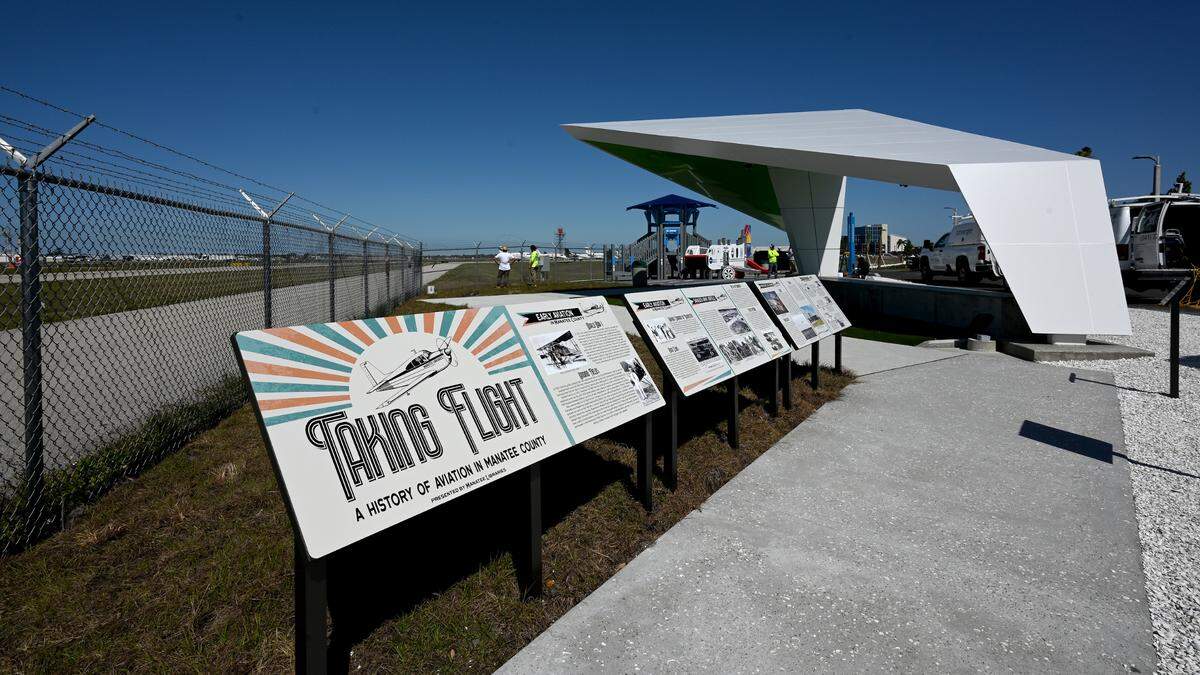 The Sarasota Manatee Airport Authority is having a ribbon-cutting for their new observation area at 8330 15th Street East, Sarasota, on March 12. Workers finish up last minute preparations on March 11.