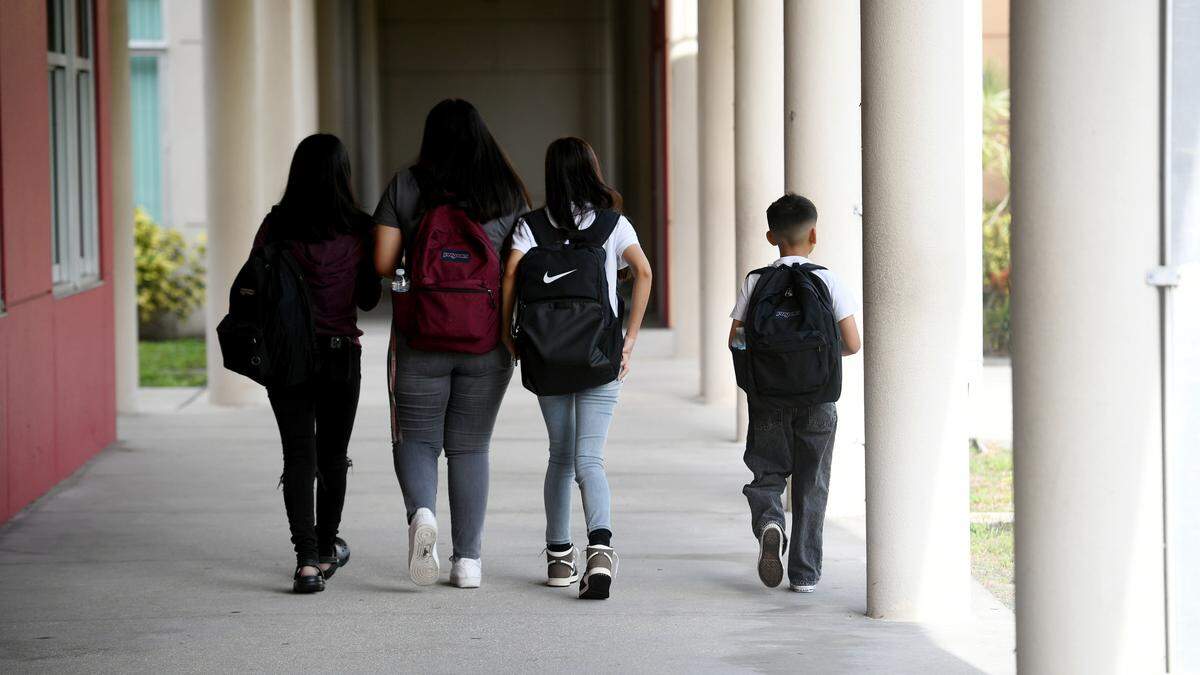 King Middle School students walk to class on the first day of school.
