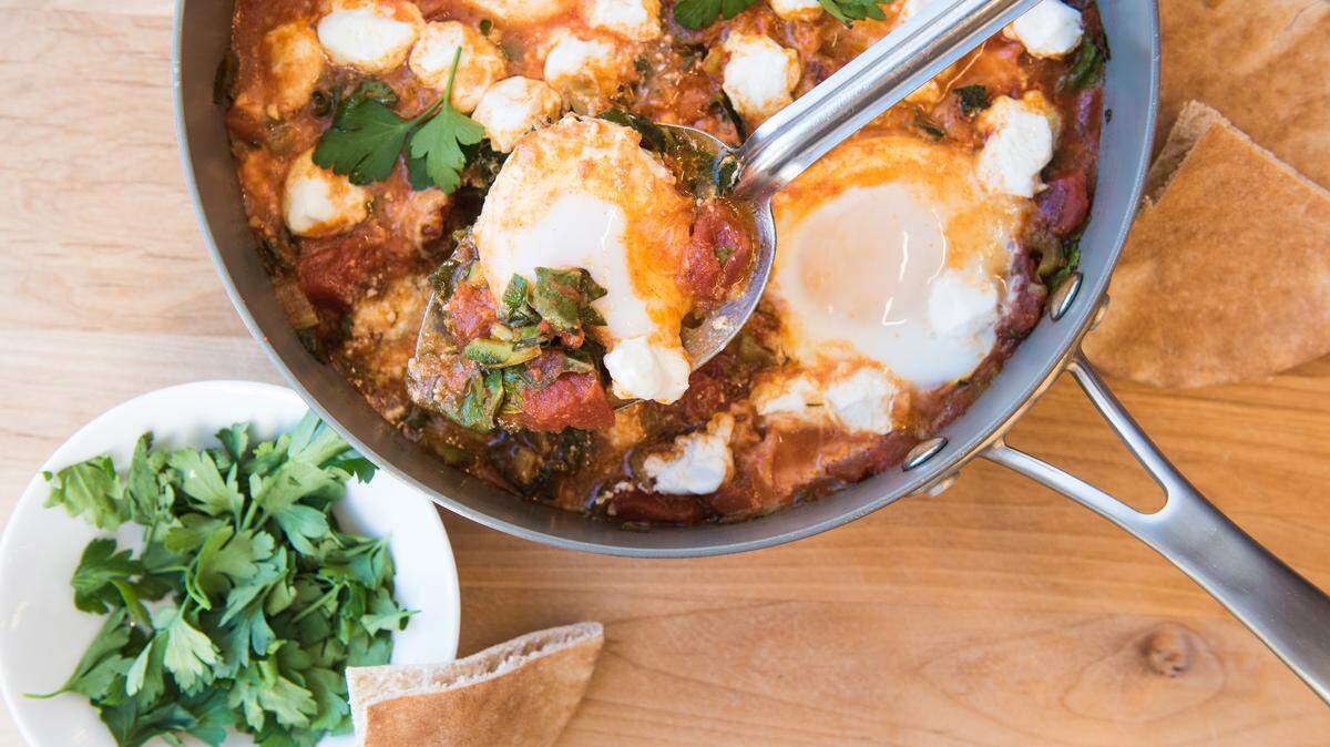 Shakshuka with swiss chard can be served anytime of the day. Dixie D. Vereen/The Washington Post
