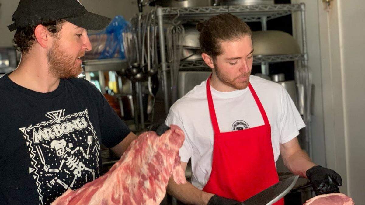 Bradenton Herald readers voted Mr. Bones BBQ as the best former restaurant in Manatee County. In this photo, the restaurant owners’ children prepare food in the kitchen.