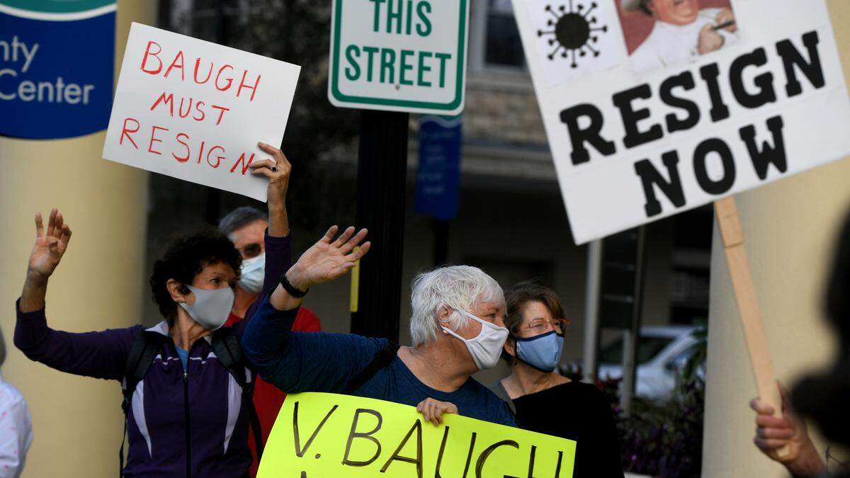 02/23/21--Protesters gather outside the Manatee County Administration building to demand the resignation of Commissioner Vanessa Baugh for her handling of a pop-up vaccination site limited to a wealthy zip code.