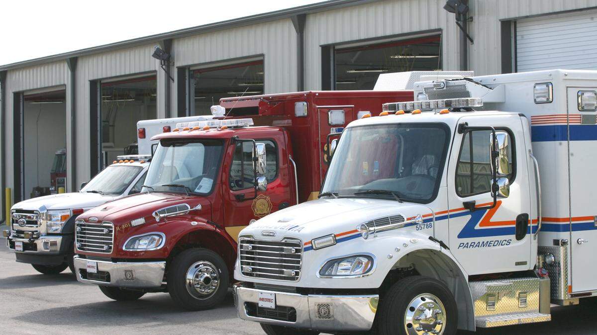 PAUL VIDELA/pvidela@bradenton.com
A row of finished ambulances, including a Manatee County EMS ambulance, at right, await inspection outside the customer delivery area at Pierce Manufacturing in Bradenton, in this March 2015 file photo. he Bradenton location has over 500 employees and is heavily recruiting for 20 more.