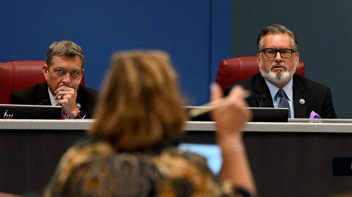 County commissioners George Kruse and Mike Rahn listen to information from Rossina Leider, Planning Section Manager, during a meeting for Linger Lodge rezone and preliminary site plan on Tuesday, Sept. 7, 2023.